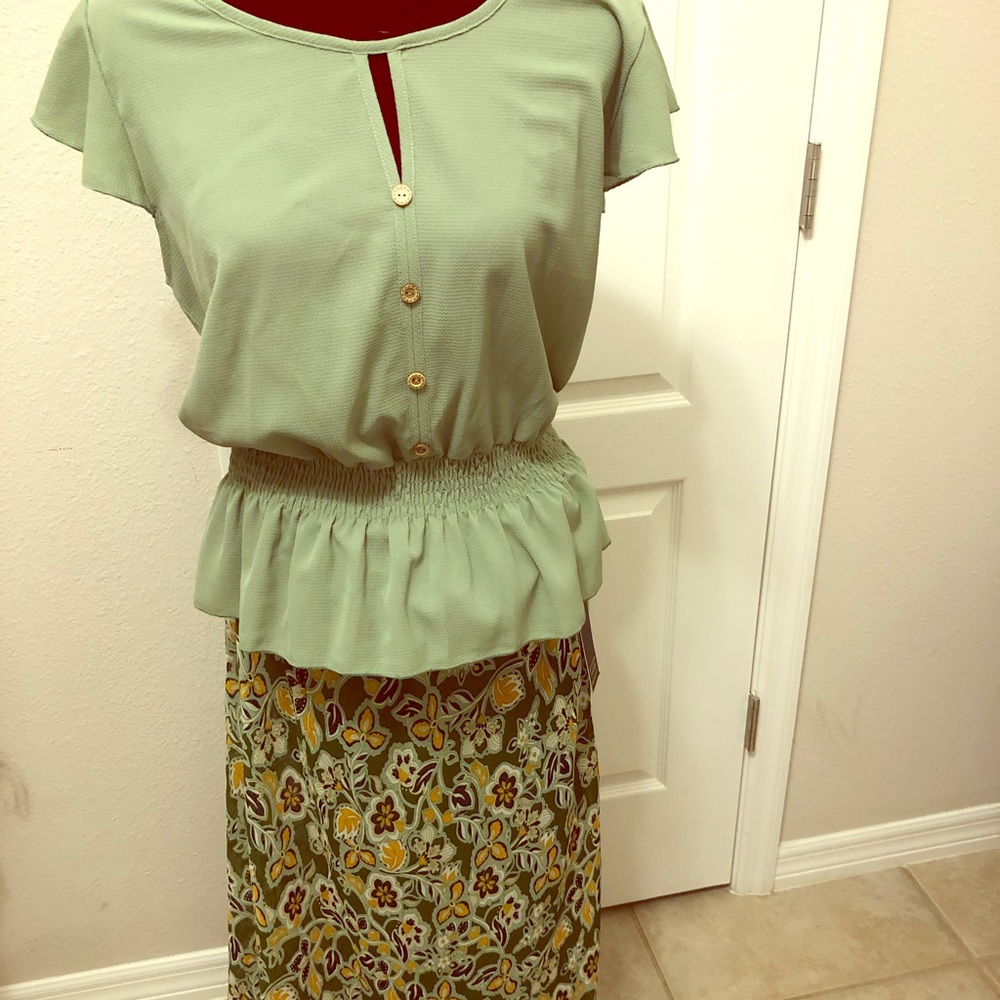 Top is XL/ Skirt is Large